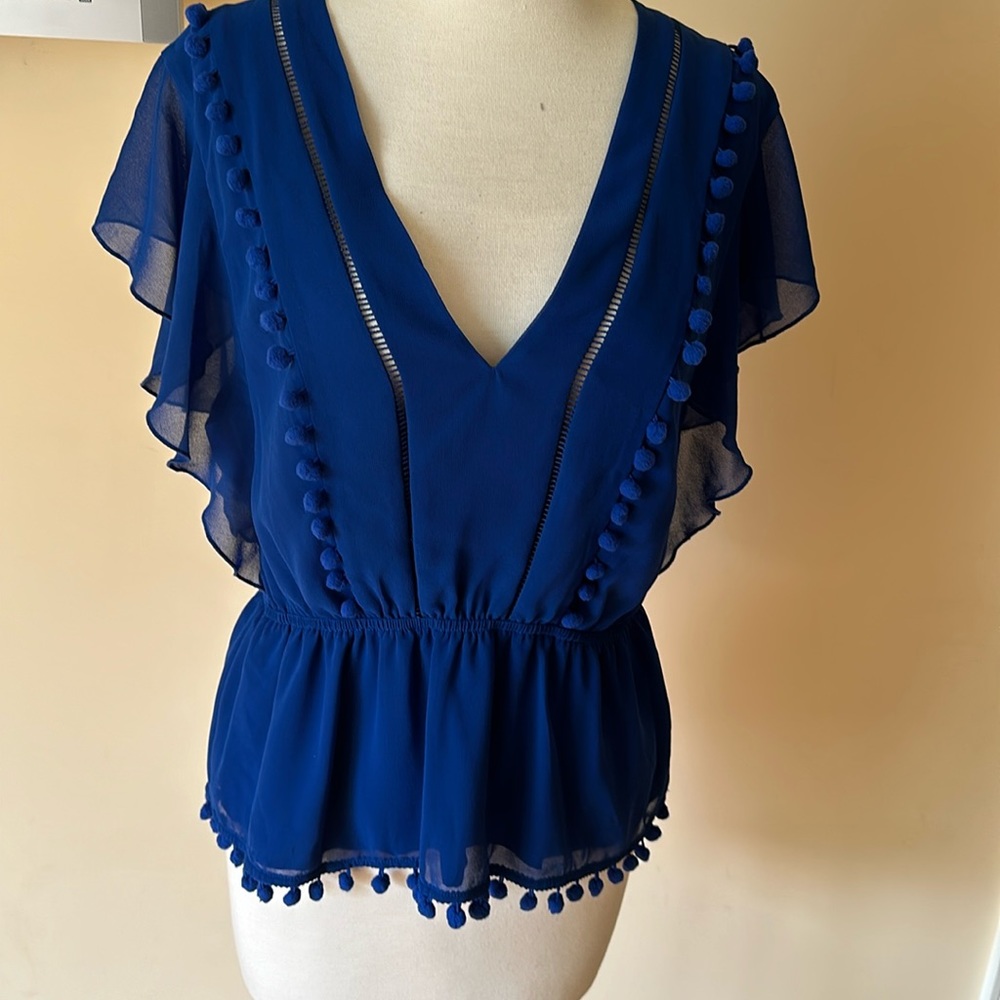Bebe button detail blouse. New.